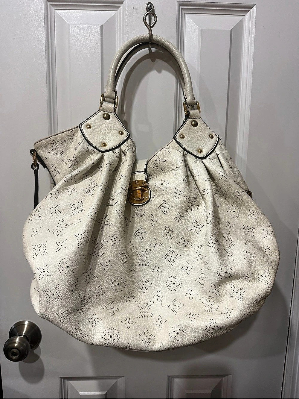 Louis Vuitton Mahina XL eggshell perforated logo leather handbag. Mint condition